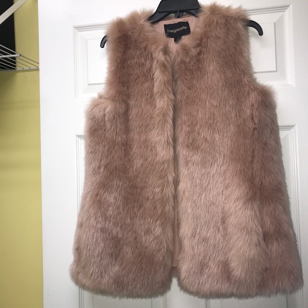 Light pink/tan faux fur vest. Size small